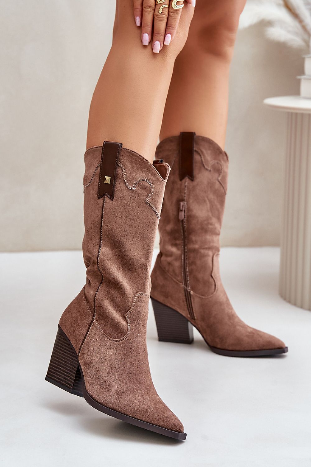 Stiefel mit Absätzen Step in style
