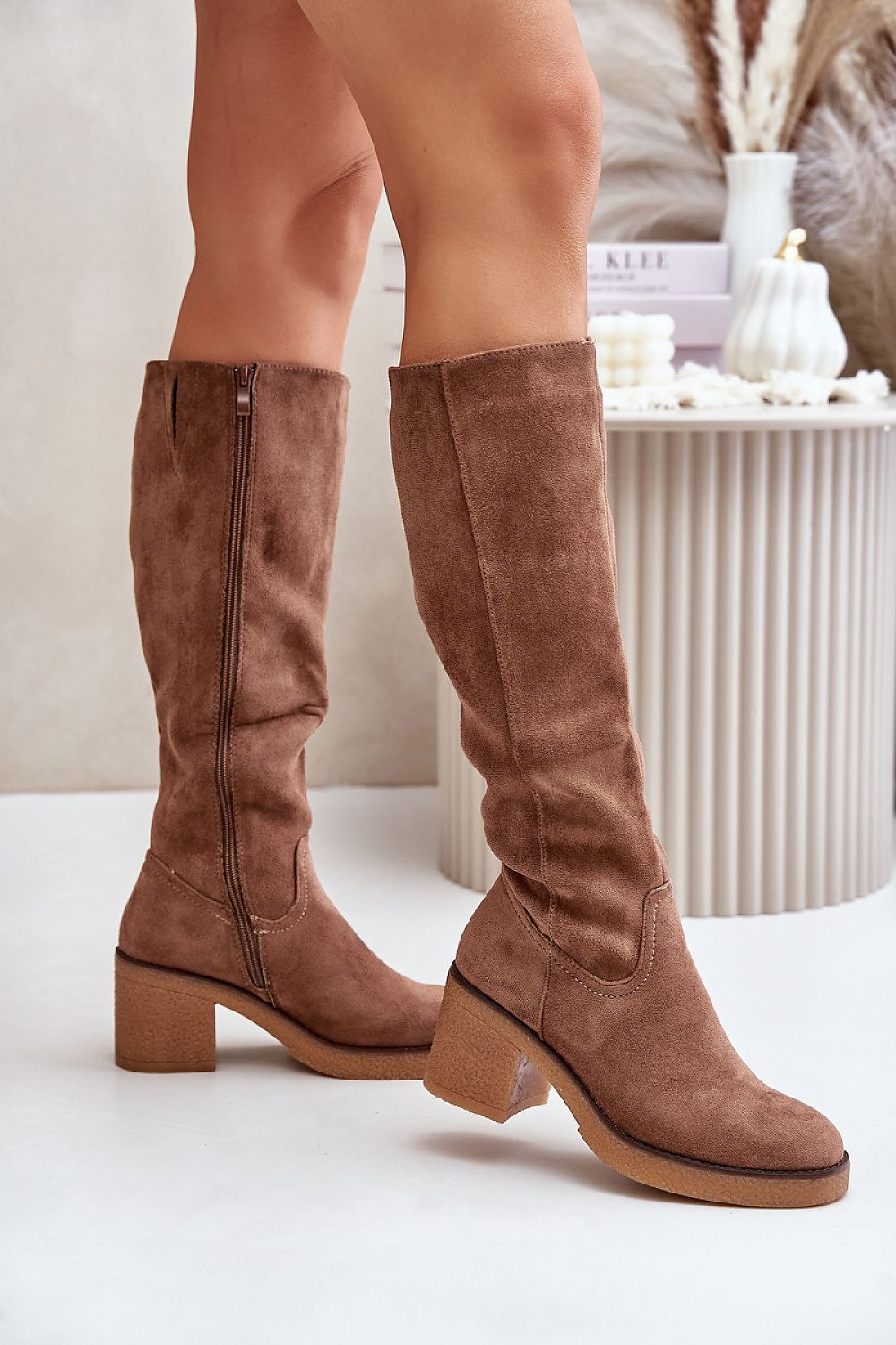 Stiefel mit Absätzen Step in style